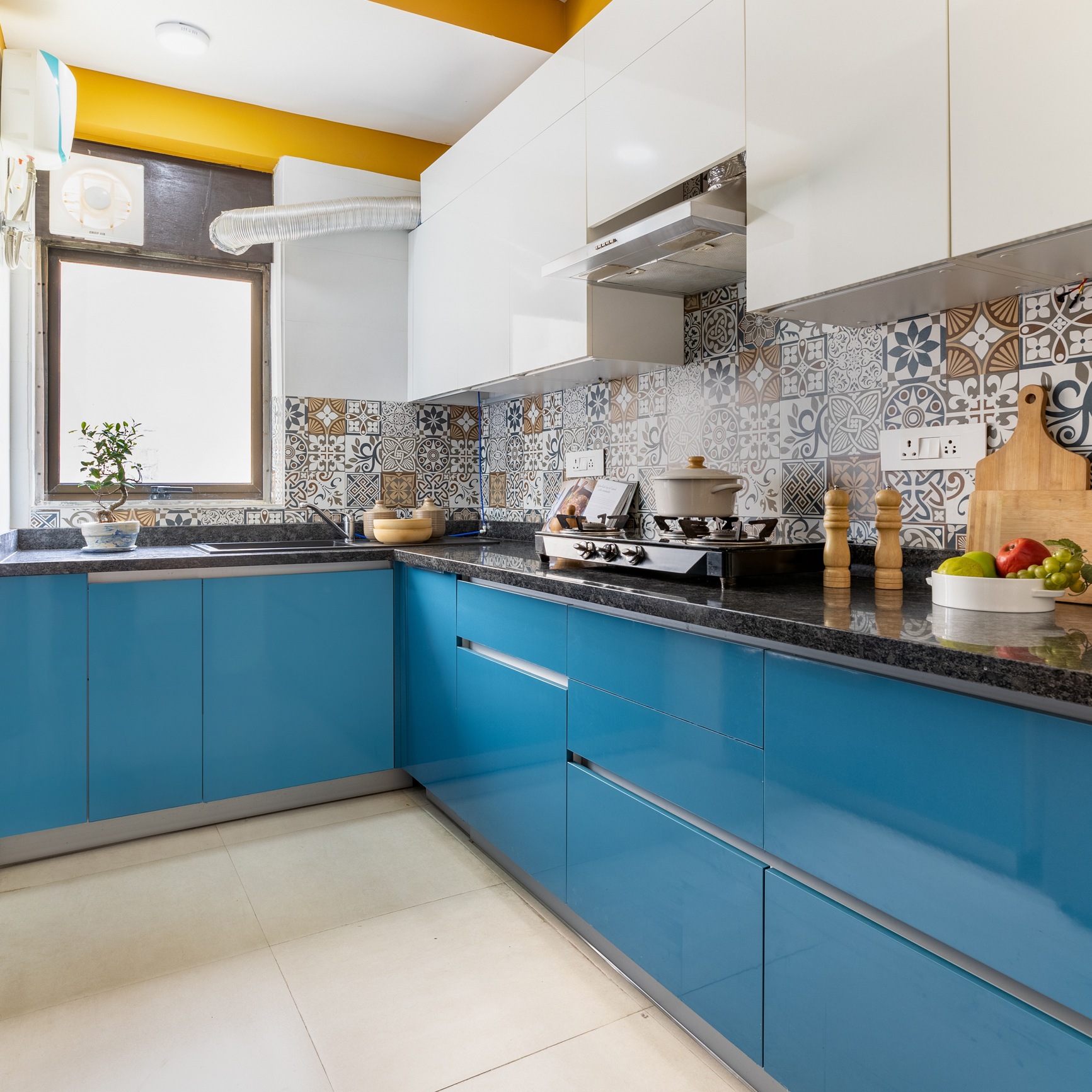 Compact Blue And Brown Kitchen Tile Design | Livspace