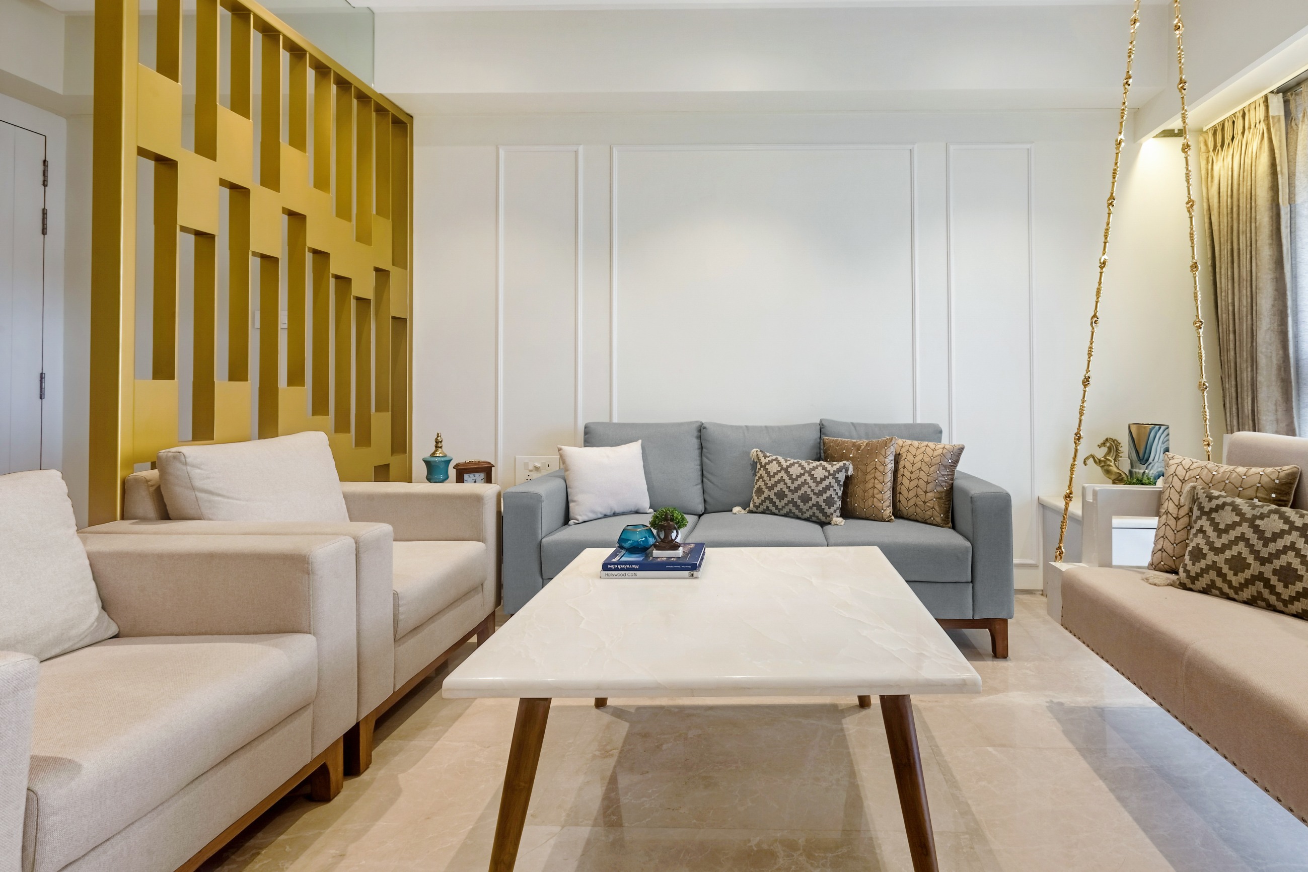White Living Room Wall Design With Wall Trims And Paint | Livspace