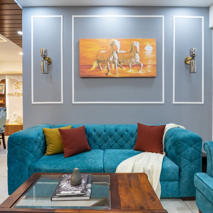 White And Blue Living Room Wall Paint With Wall Trims | Livspace