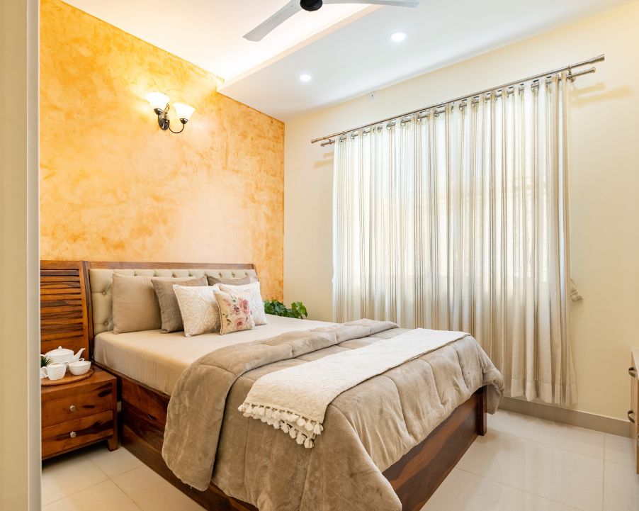 Image showcasing Textured Wall Paint Design With Sconces | Livspace