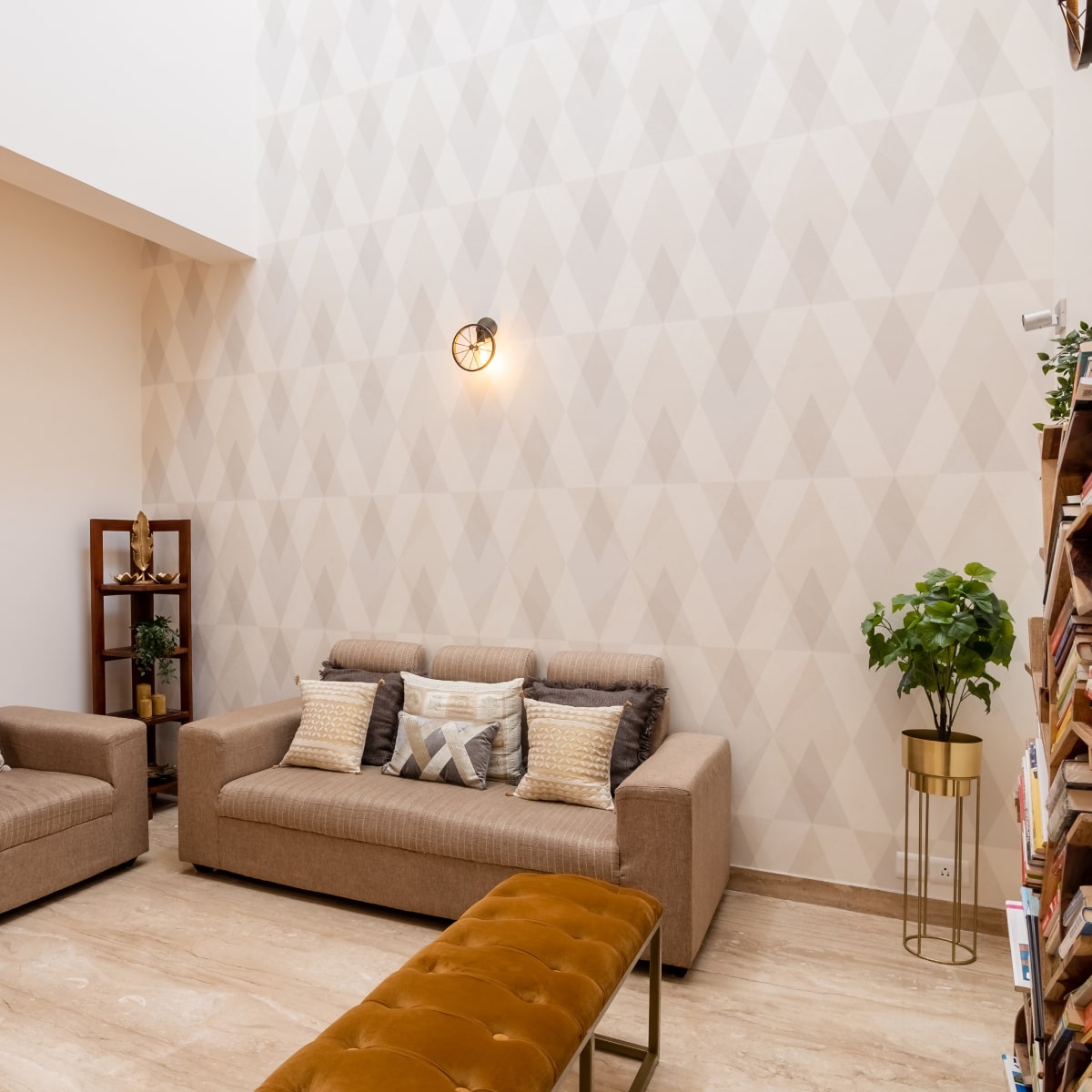 Neutral-Toned Living Room Wallpaper With Wall Sconces | Livspace