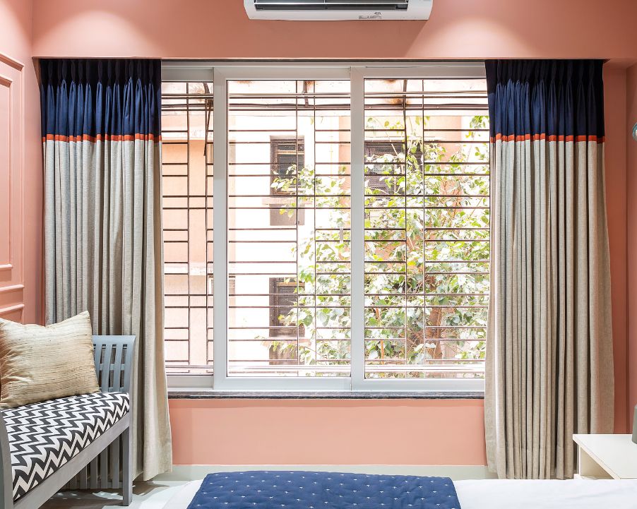Tall Window Grill Design With Shutters | Livspace