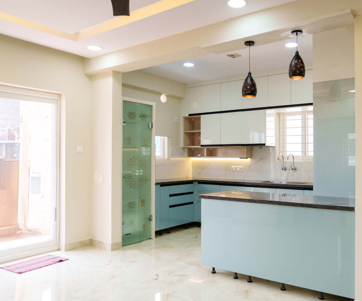 Modern Island Kitchen Design With Marble and Pendant Lights | Livspace