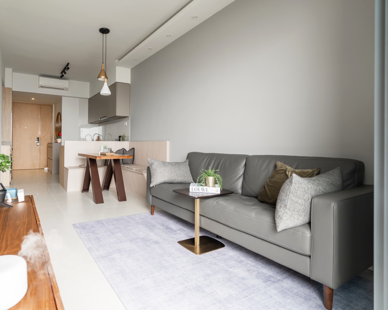 Compact Living Room Design With A Metallic Table | Livspace