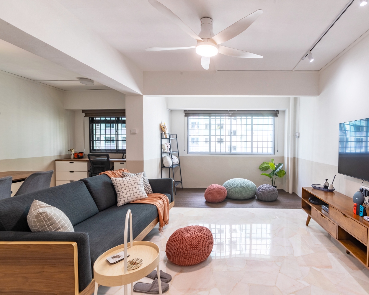 Spacious Living Room Design with A Brown Side Table | Livspace