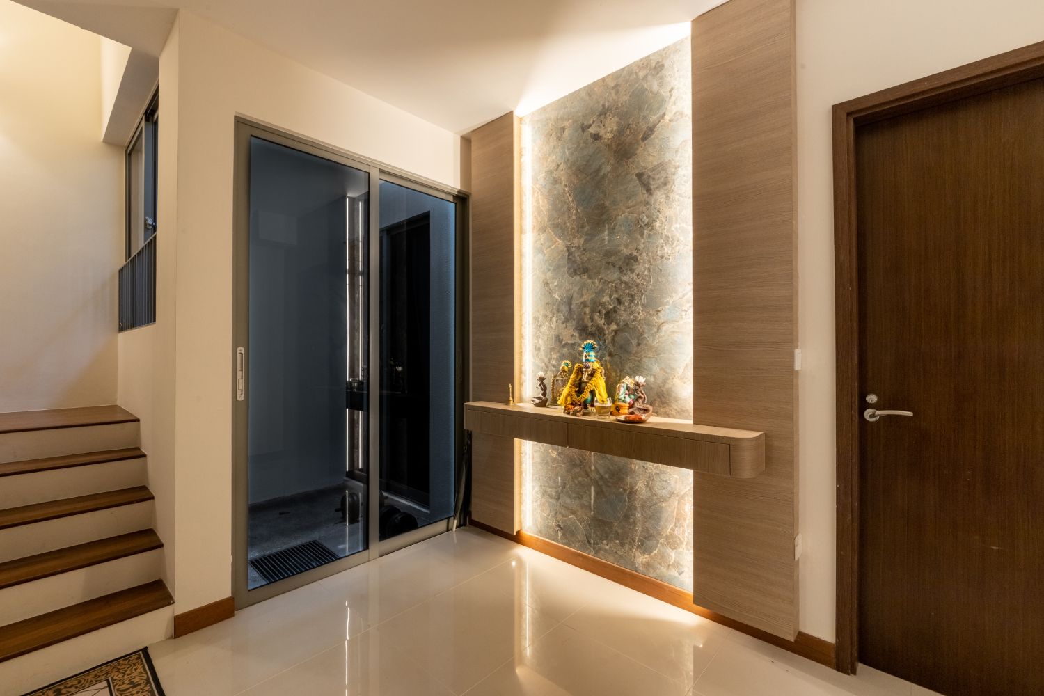 Wall Design For Foyers With Grey Wall Panel And Wooden Panelling | Livspace