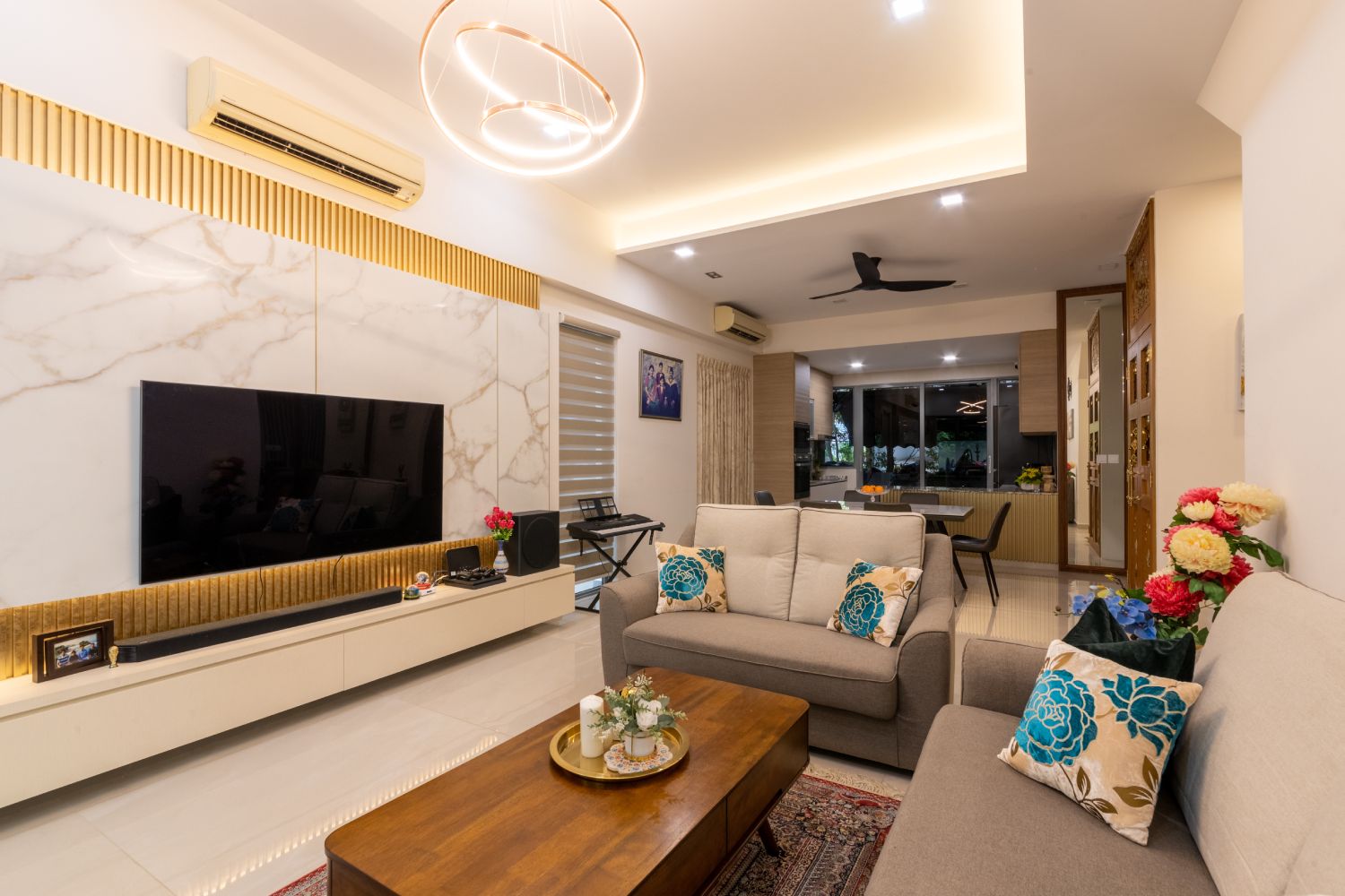 Cream and marble TV unit design with wall mounted console | Livspace
