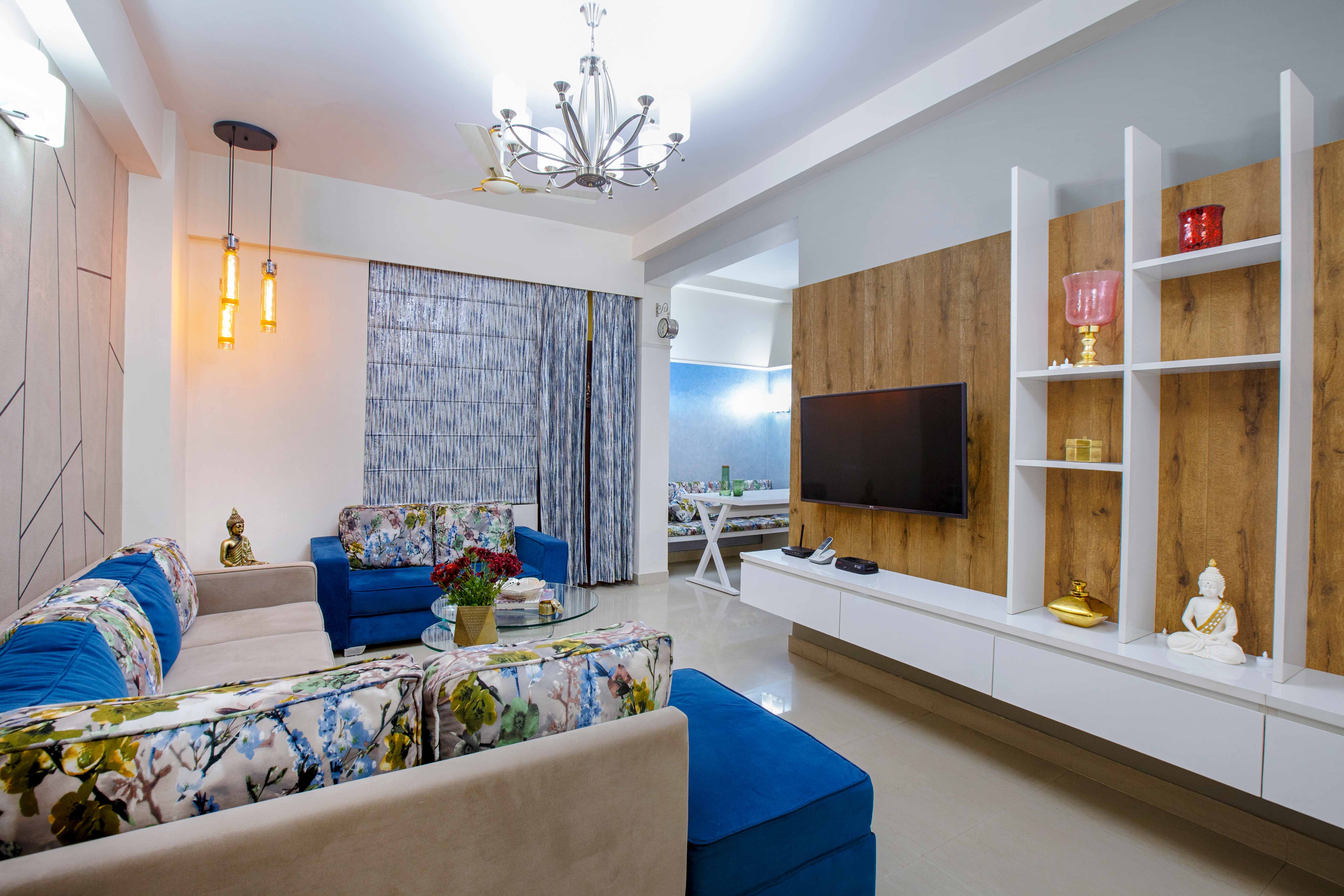 Modern TV Unit Design with Wood and White Shelving | Livspace
