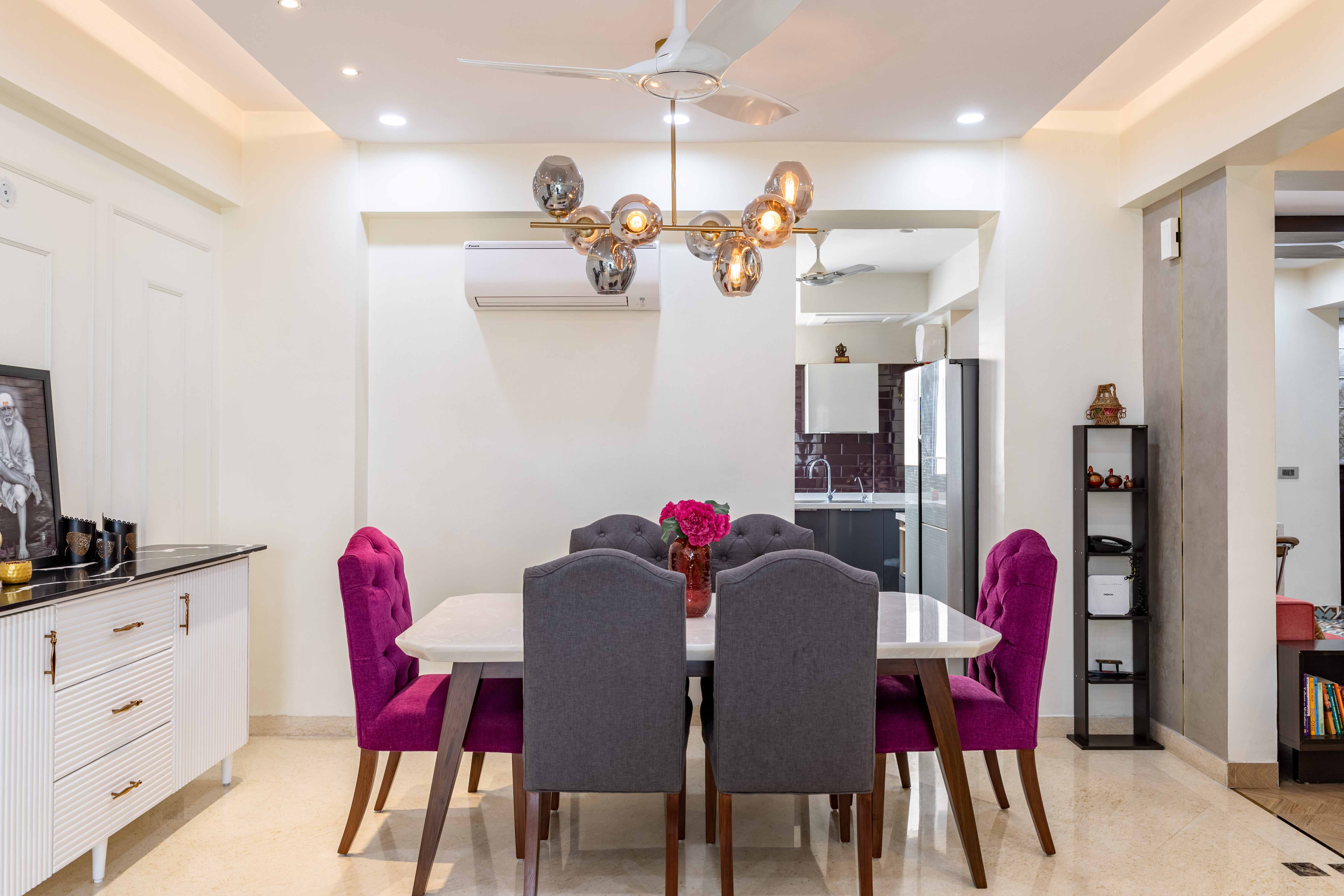 6-Seater Dining Hall With Hanging Lights | Livspace