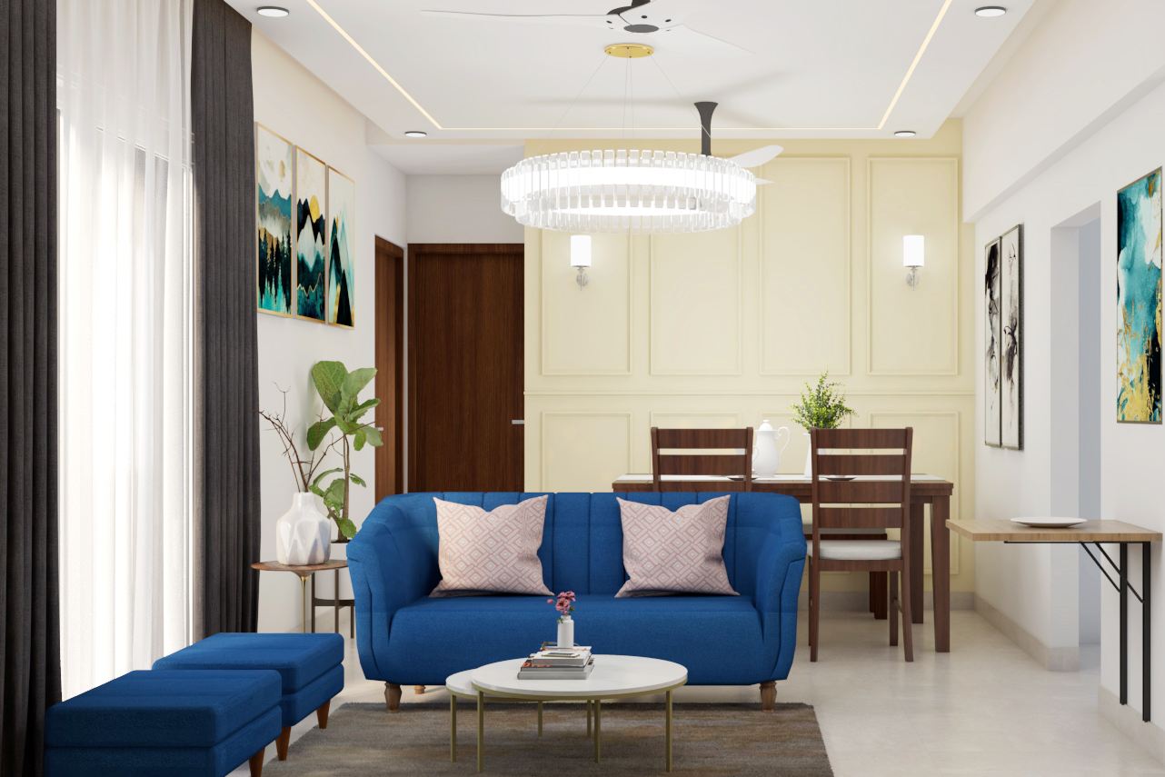 Современный дизайн просторной гостиной с синим мягким диваном