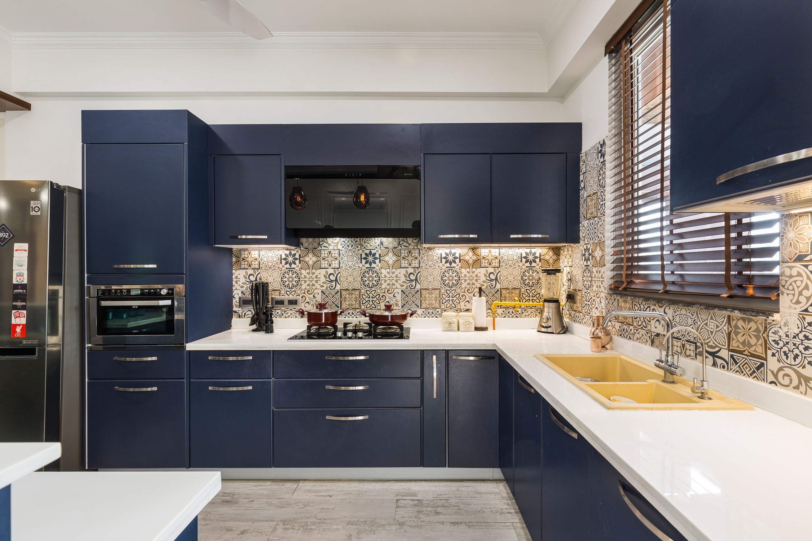 Modern L-Shape Modular Kitchen Design With Wave Blue Cabinets and ...