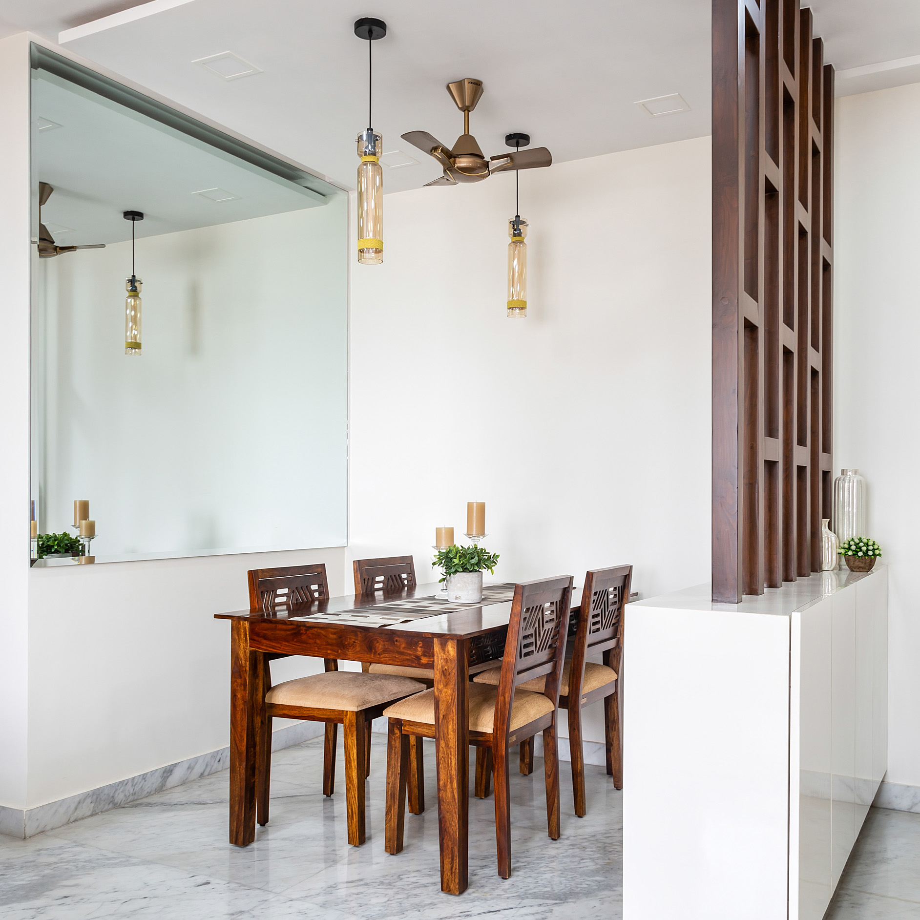 Spacious 4-Seater Dining Room Design For Rentals | Livspace
