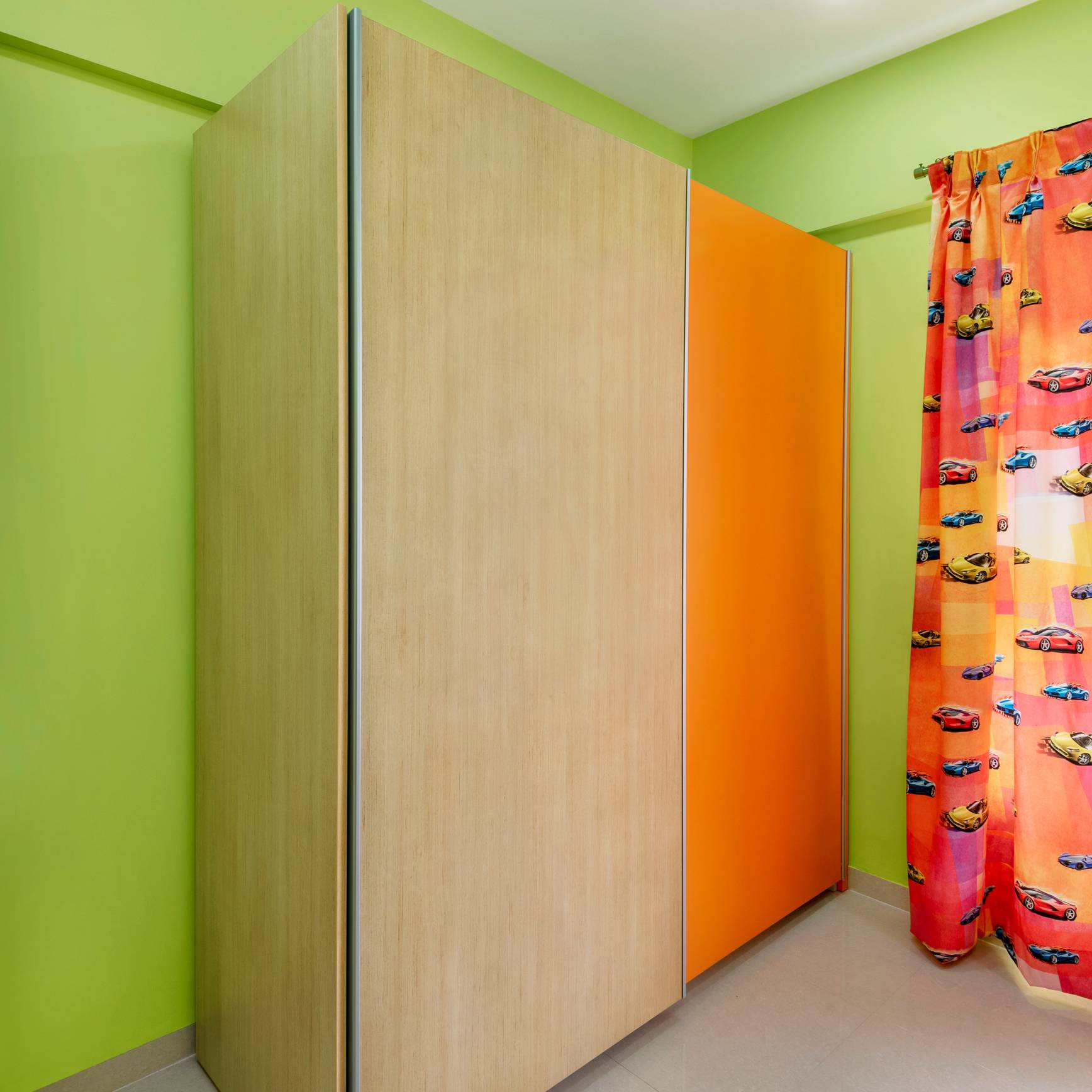 Green Kid's Bedroom Design With Sliding Wardrobe | Livspace
