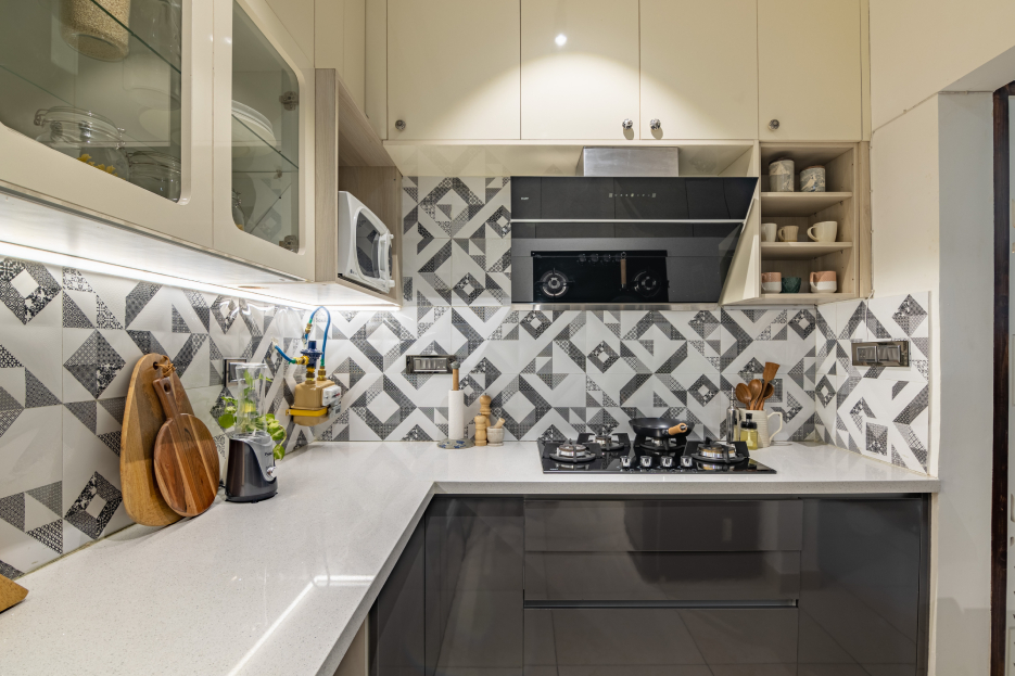 Modular Kitchen Design With Wicker Baskets And Loft Storage | Livspace