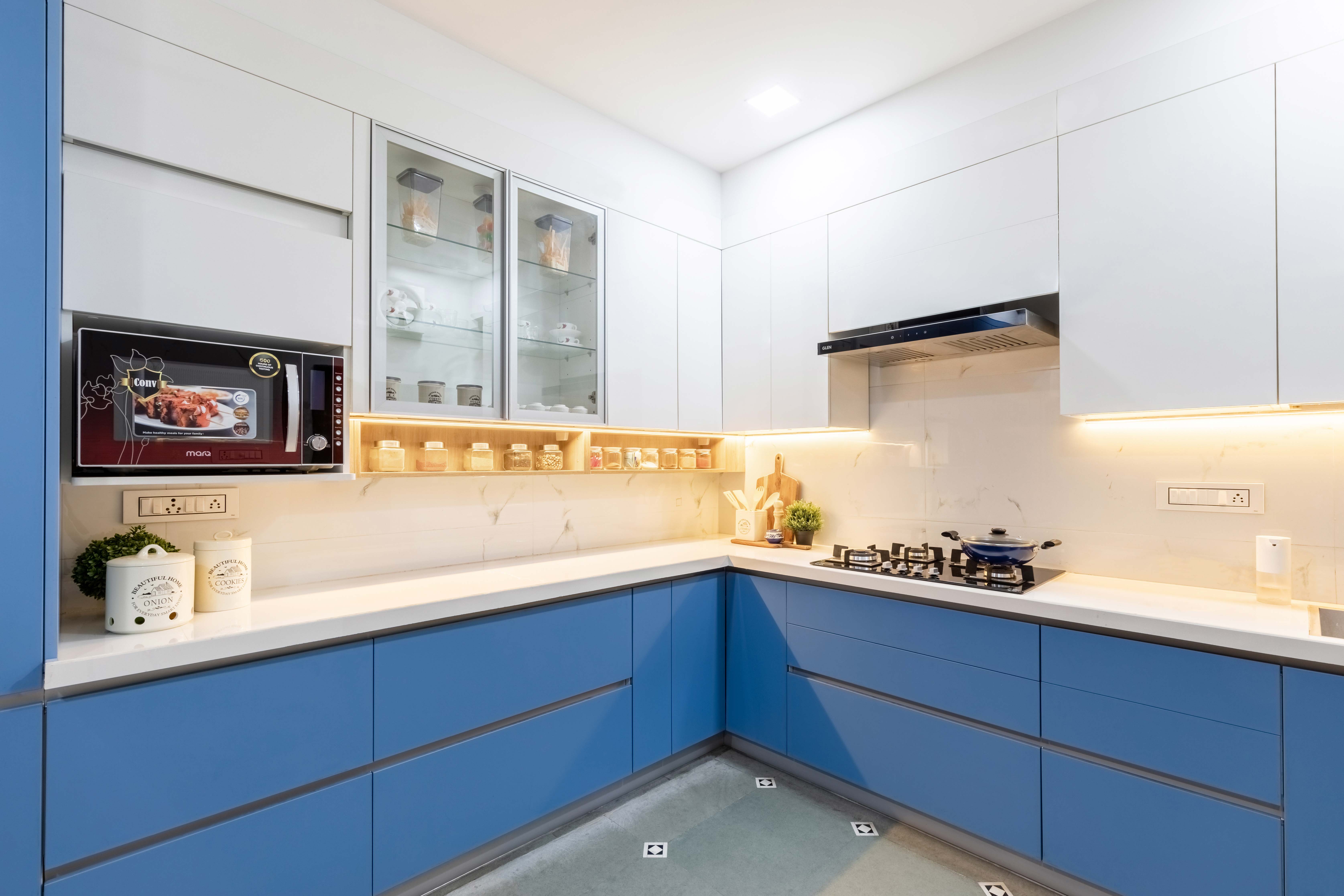 Blue And White Spacious Kitchen Design | Livspace