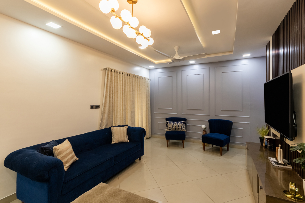 Hall Interior Design With Blue Upholstery | Livspace