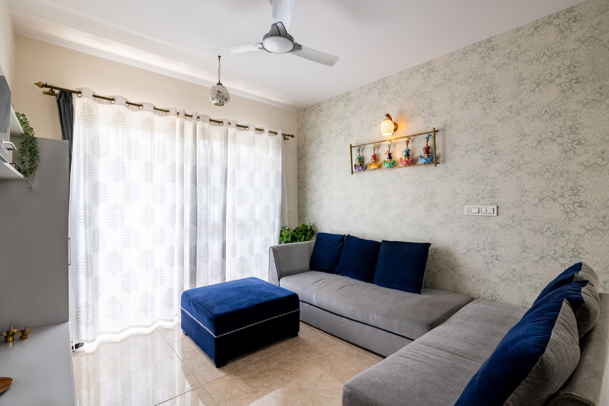 Compact Living Room Design With Grey Textured Wallpaper | Livspace