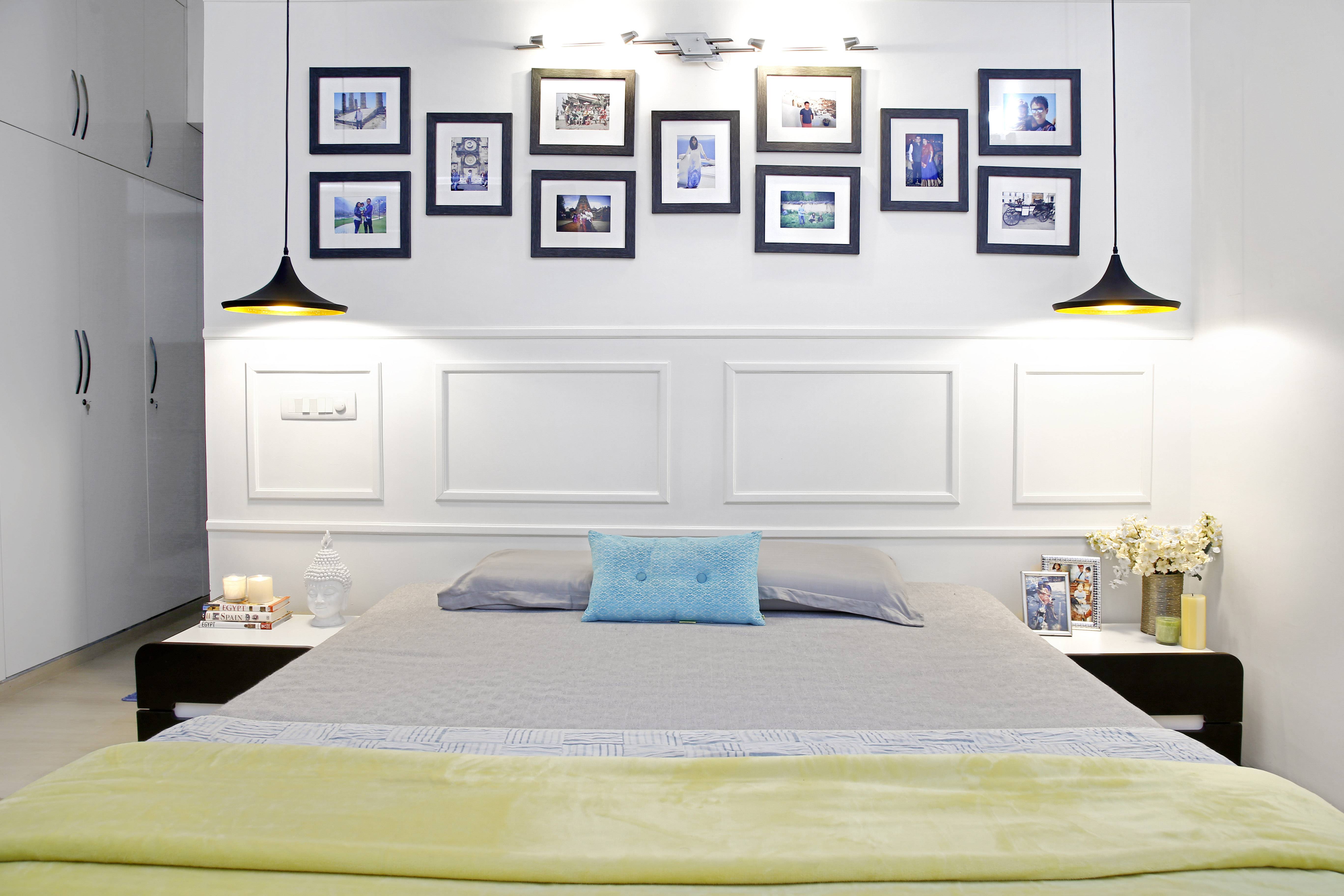 Spacious Bedroom Design With Black Hanging Lights | Livspace