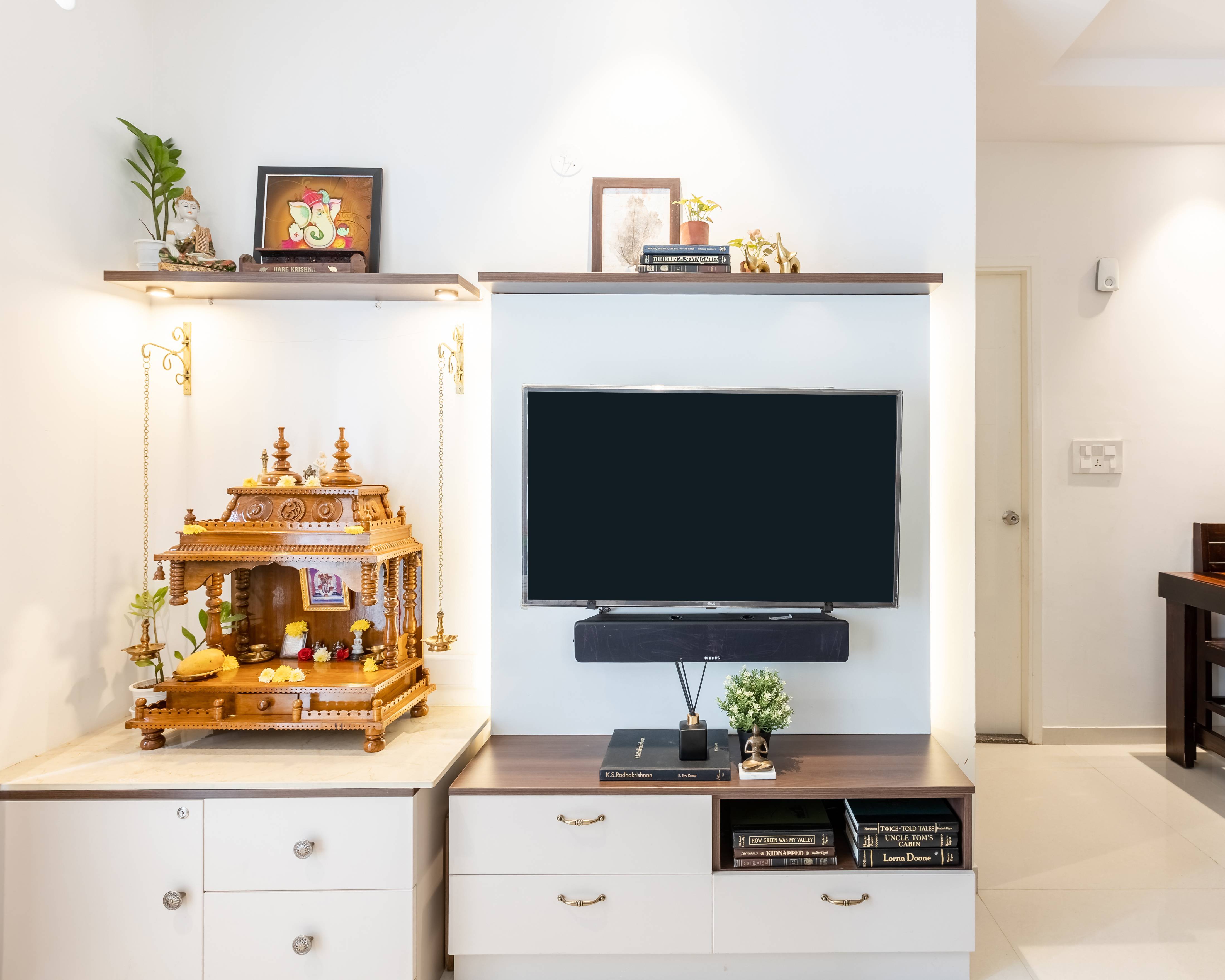 Spacious TV Cabinet Design With Pooja Unit | Livspace