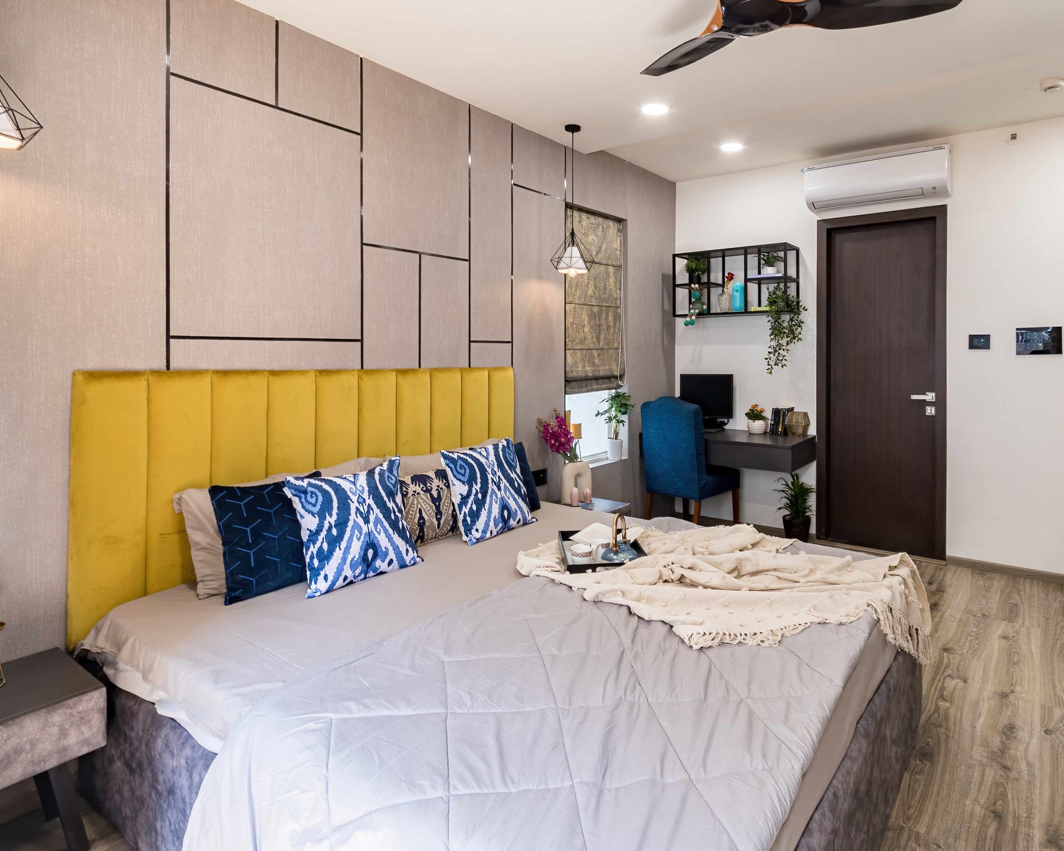 Wall Design For Bedroom With Light Beige Panelling | Livspace