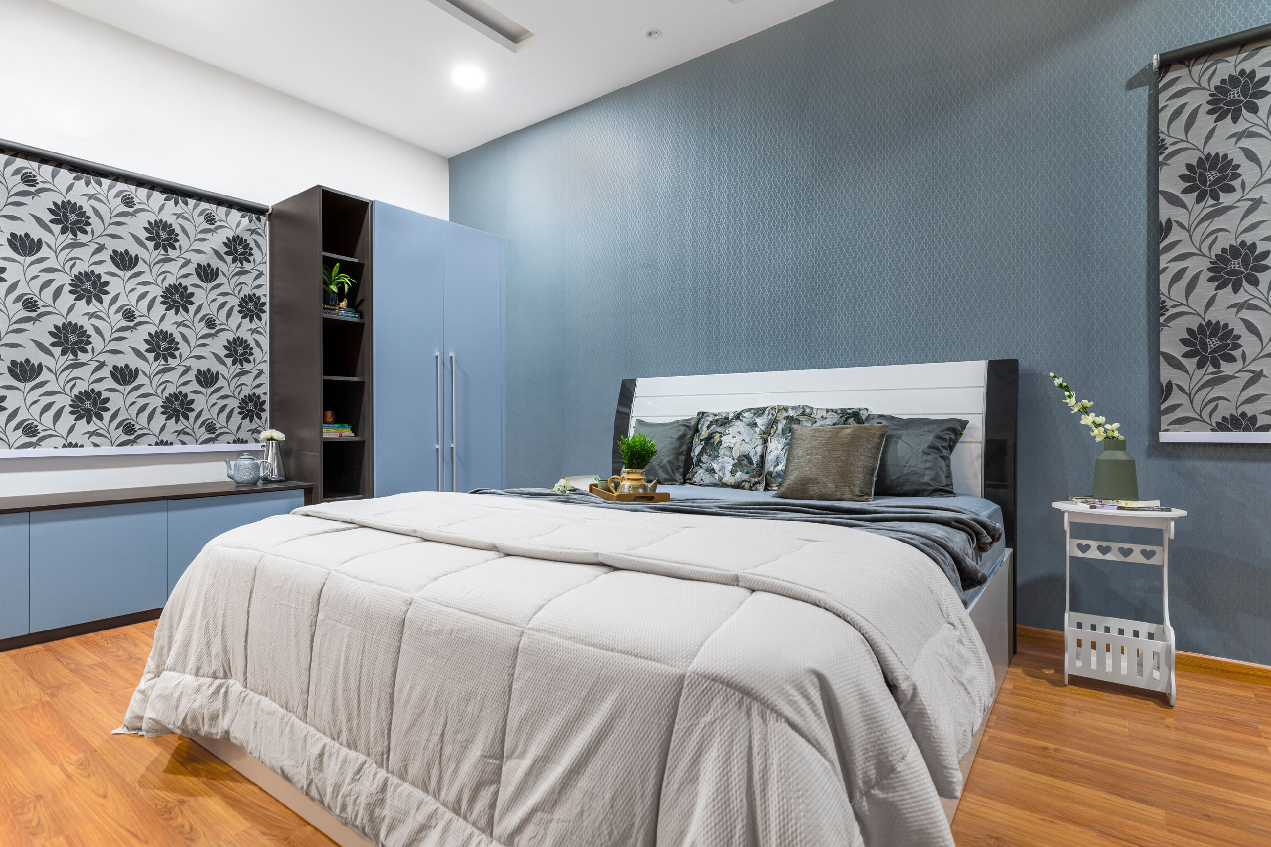 Guest Bedroom Design With Blue And Brown 2-Door Swing Wardrobe And Open