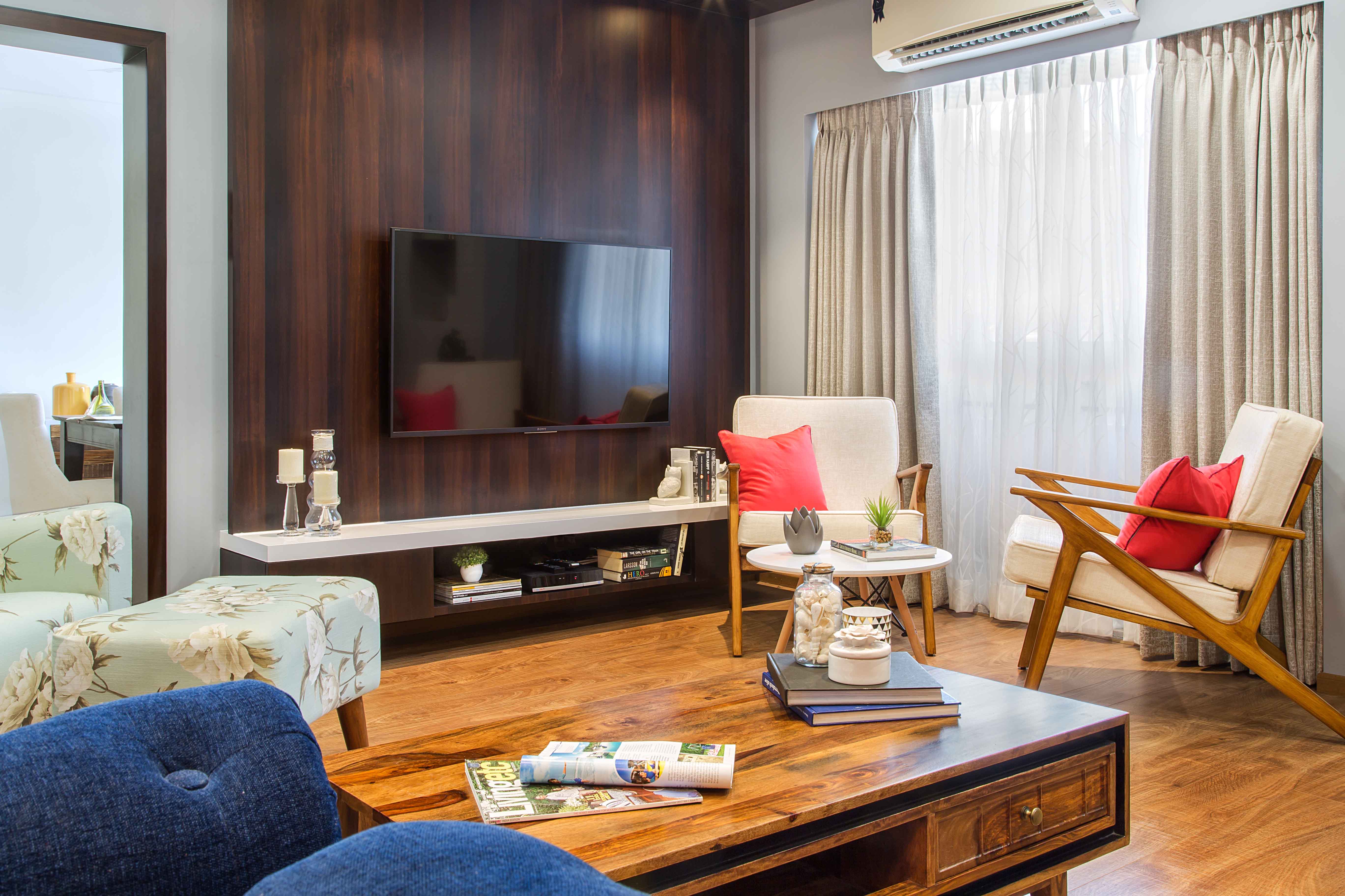 Mumbai Flat Design With Spacious Blue Living Room And Floral Accent ...