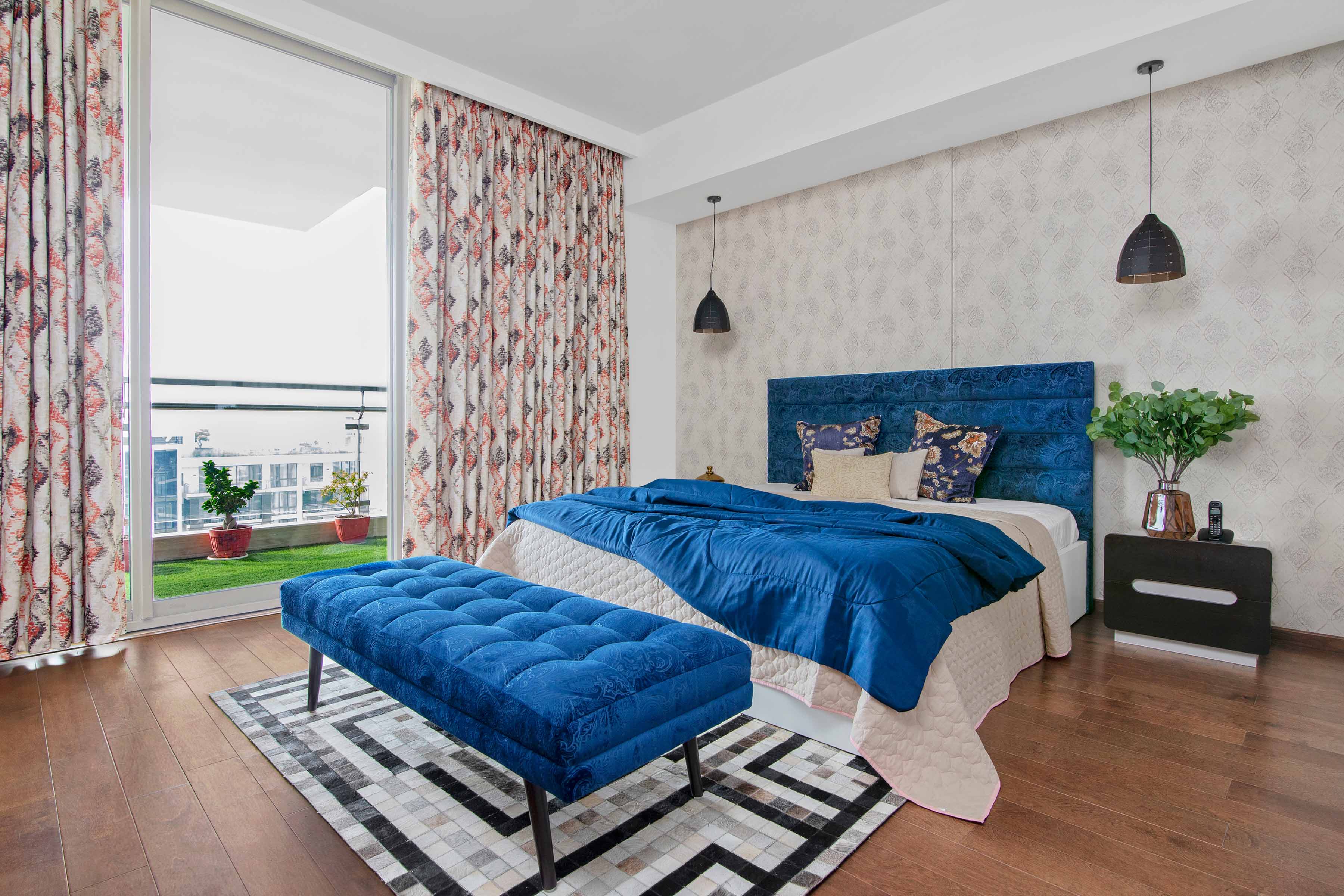 Spacious Master Bedroom Design With Black And White TV Unit And Beige ...