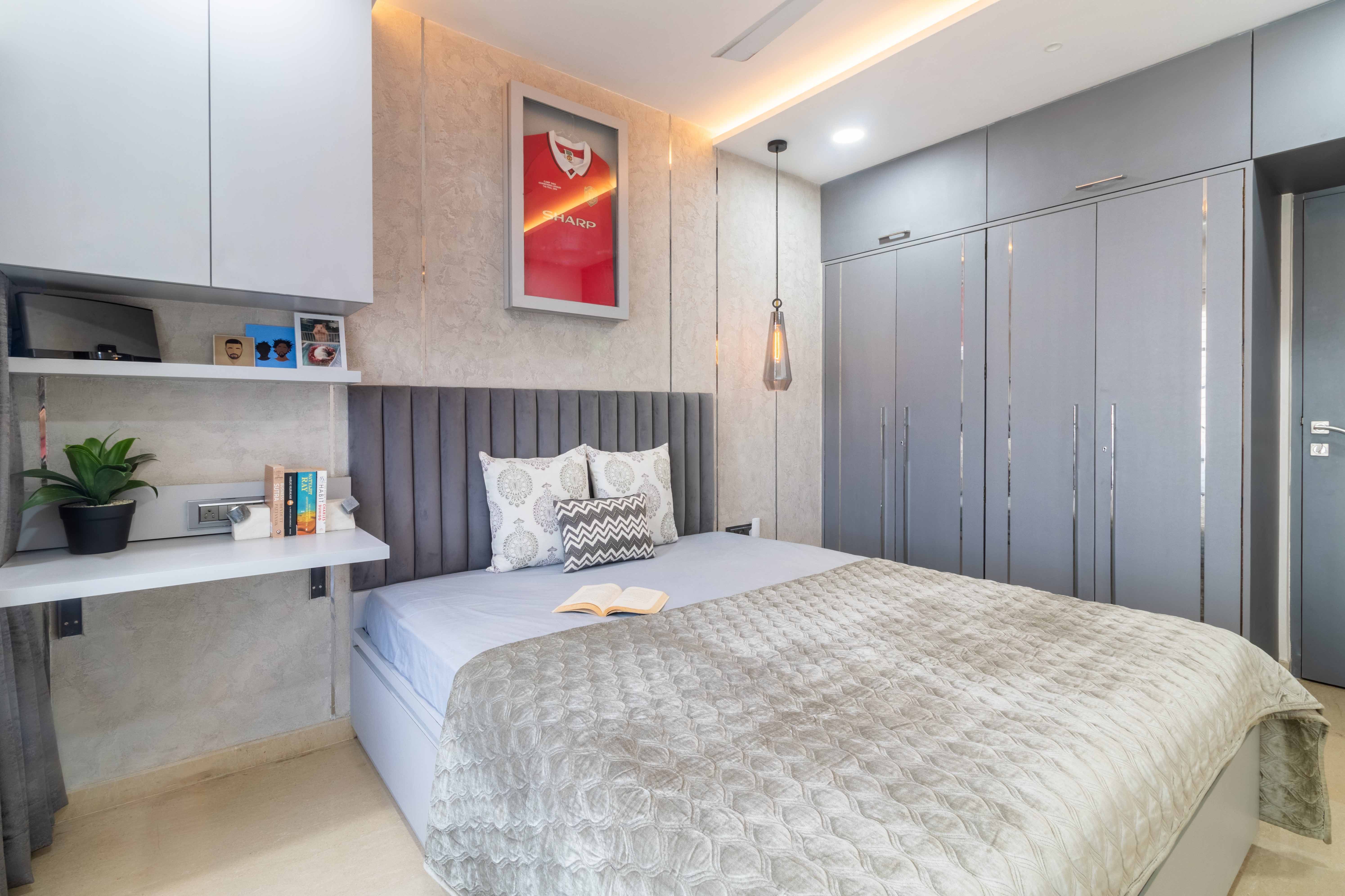 Spacious Master Bedroom Design With Grey 4-Door Swing Wardrobe And Grey ...