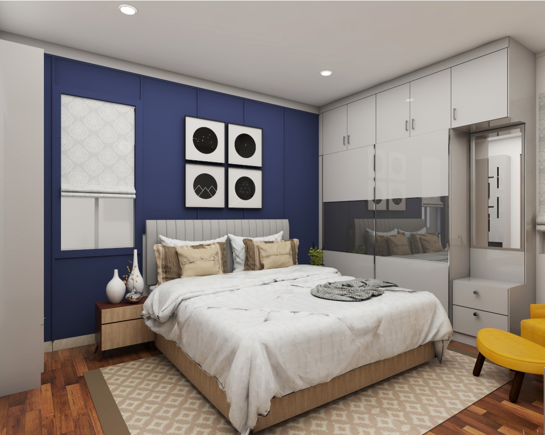Spacious Guest Bedroom Design With Wardrobe and Dressing Table | Livspace