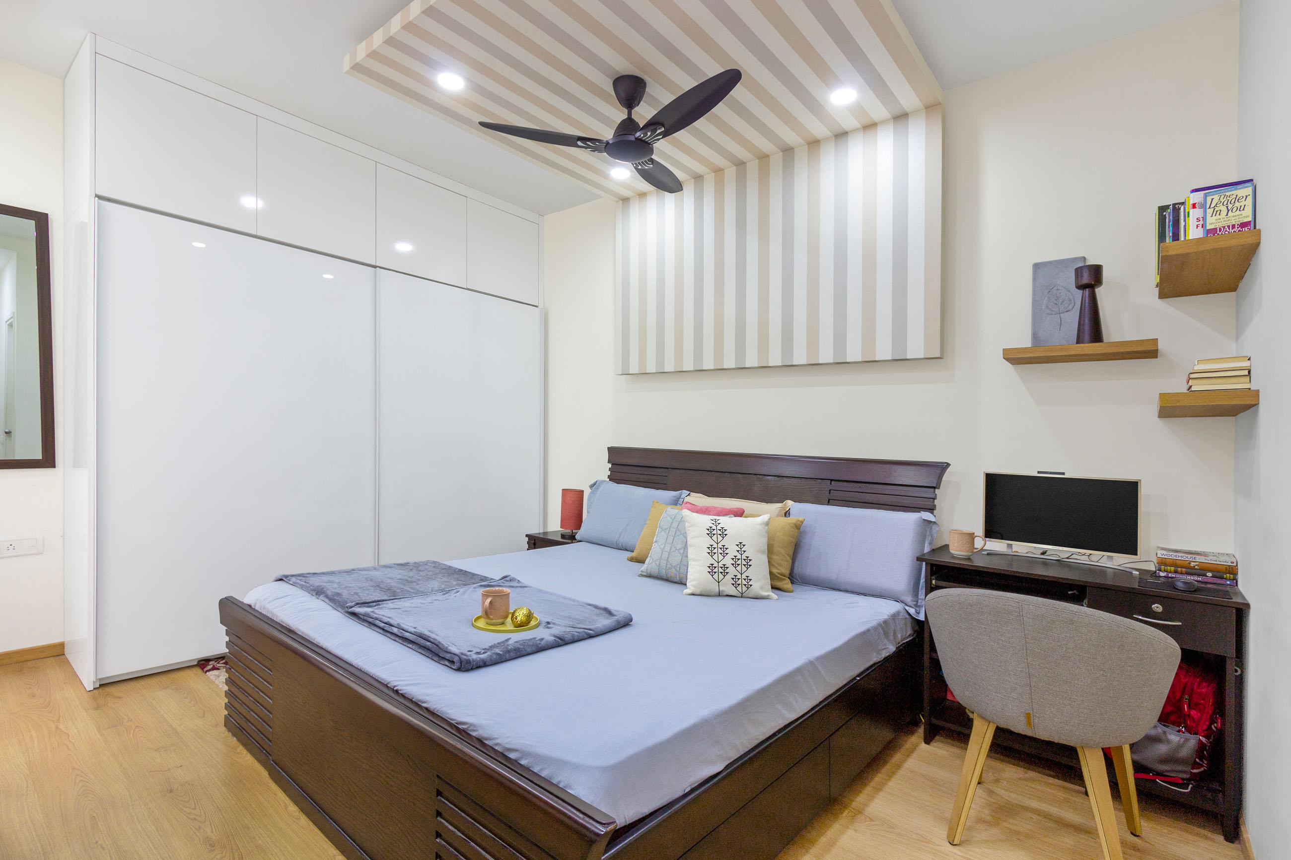 Guest Room Design With White Glossy 2-Door Sliding Wardrobe | Livspace