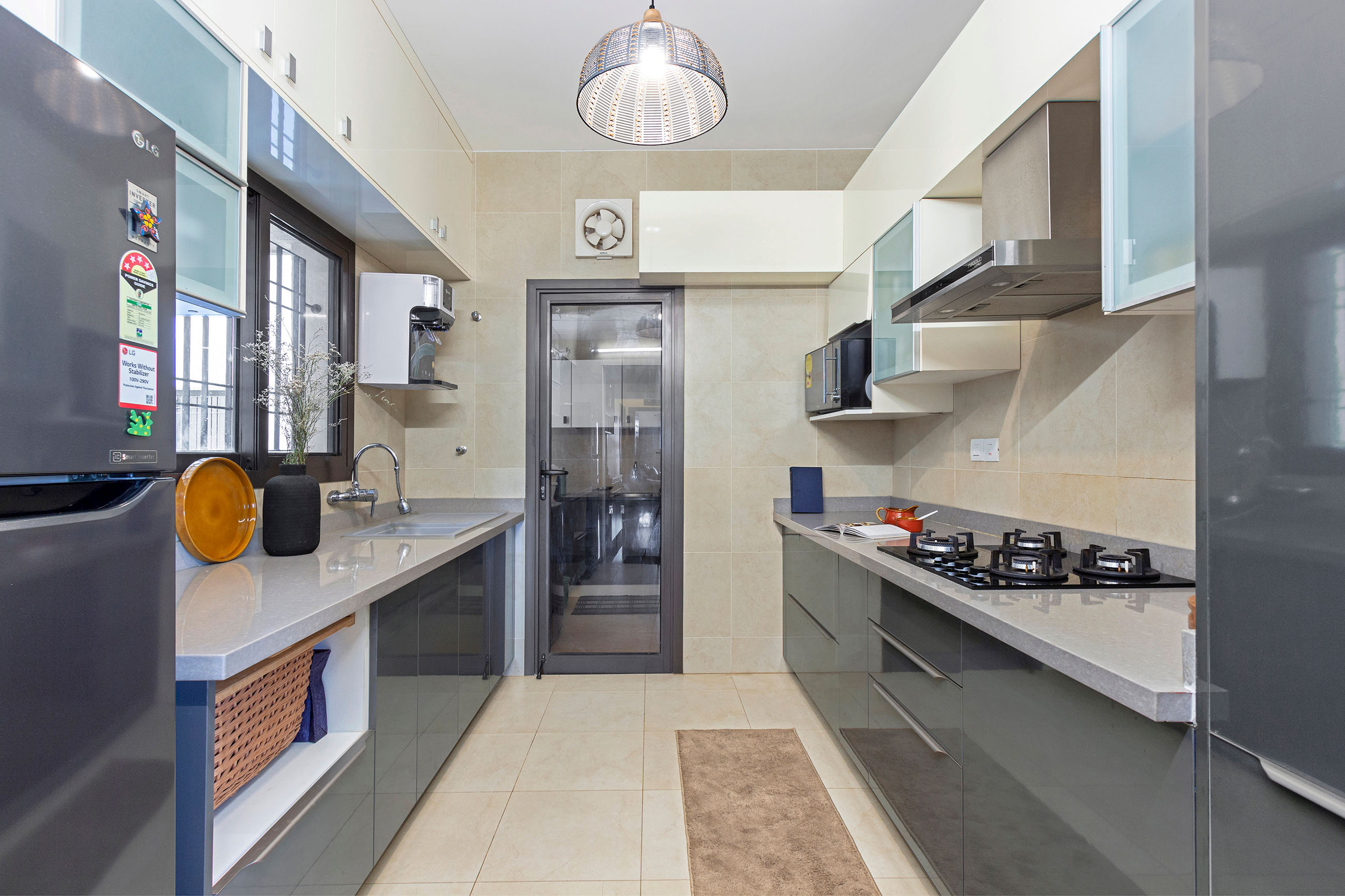 Parallel Modular Kitchen Design In River Stone And Champagne-Tones ...