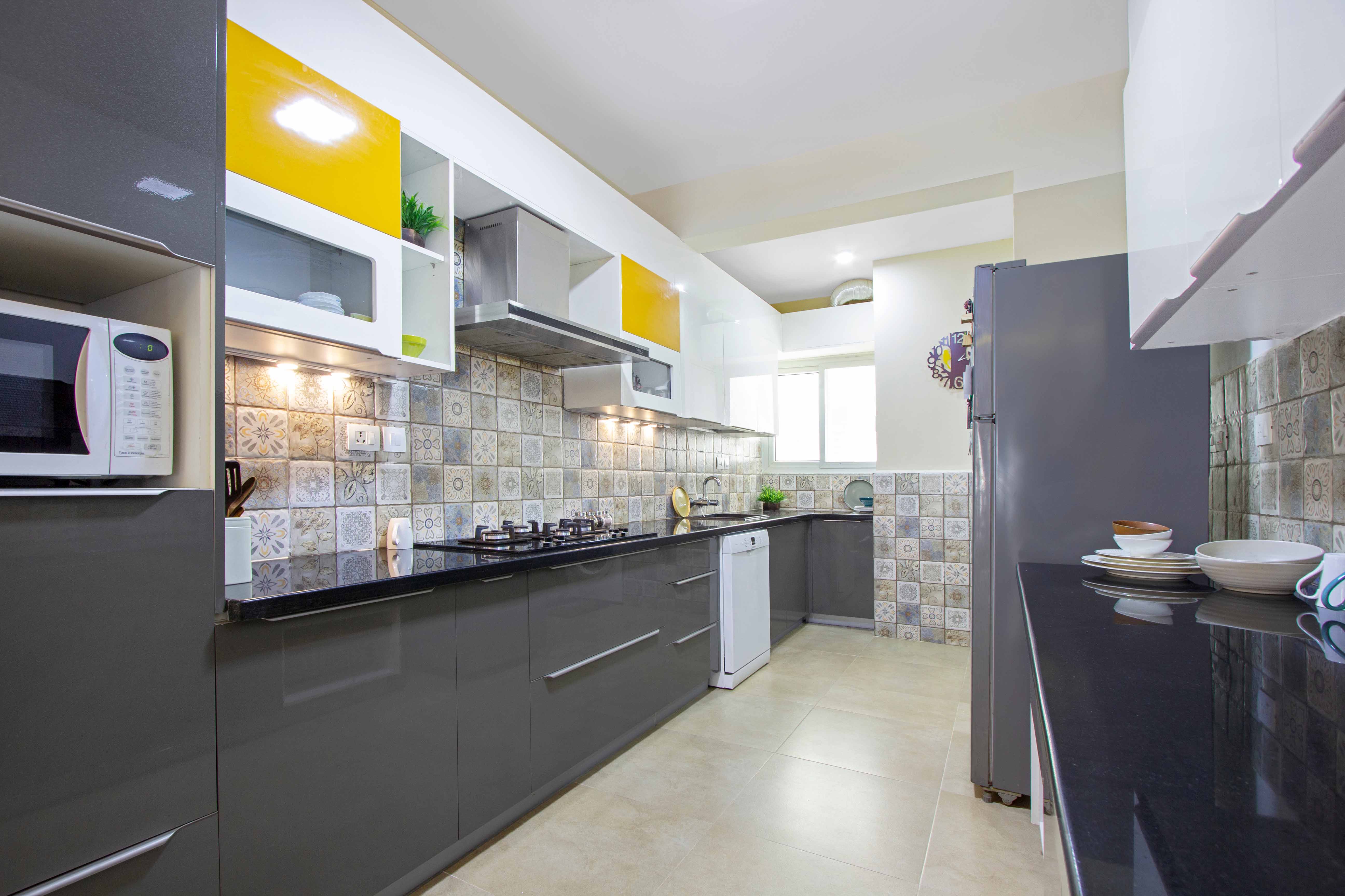 Multicolored Parallel Kitchen Design With Moroccan Backsplash | Livspace