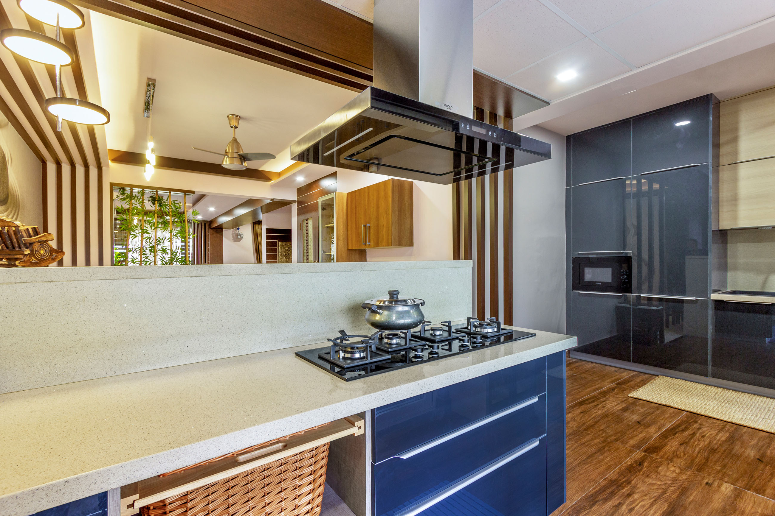 Modular Island Kitchen Design With Dark Grey And Acacia Cabinets | Livspace
