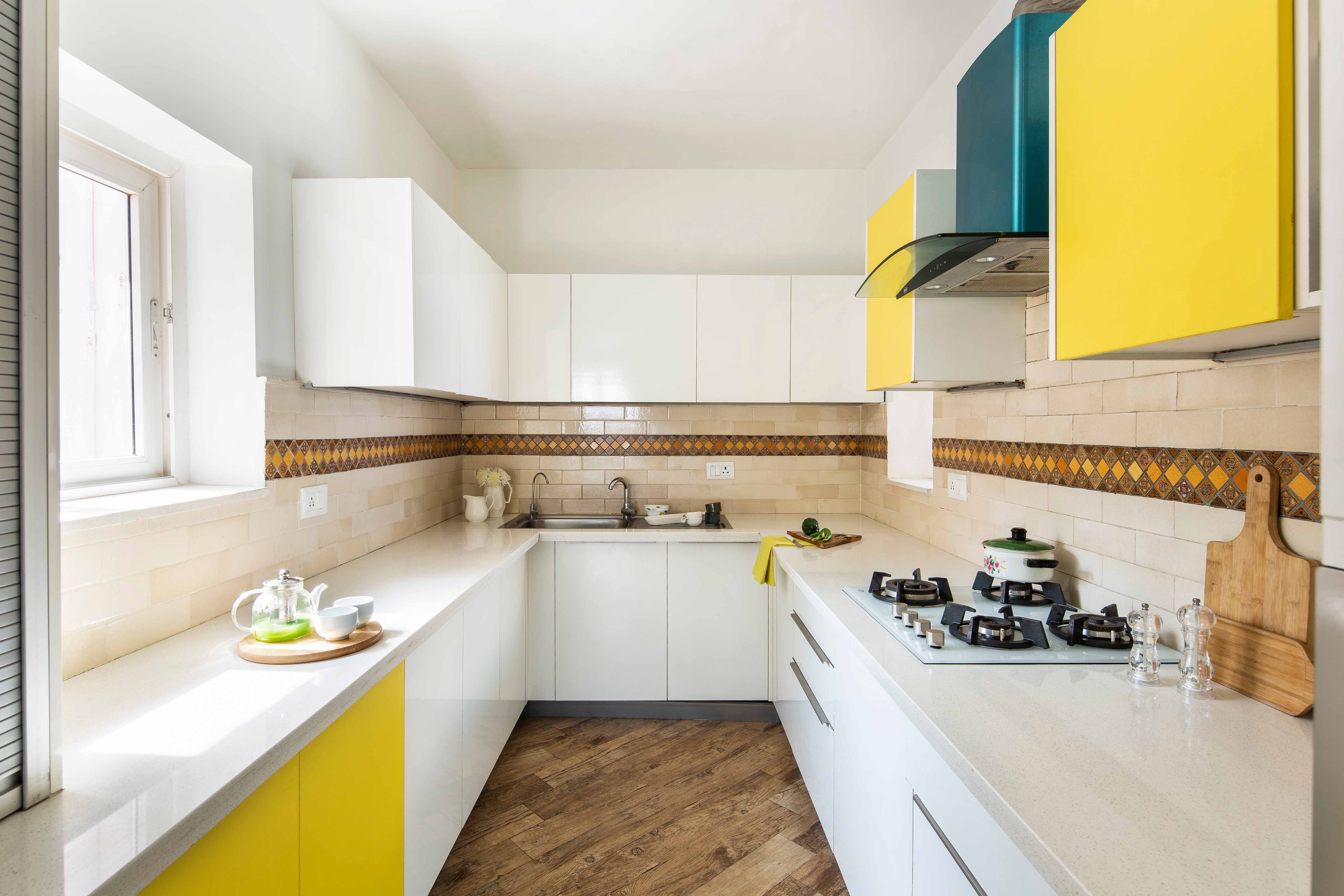 Modular U-Shaped Kitchen Design In Frosty White And Marigold Yellow ...
