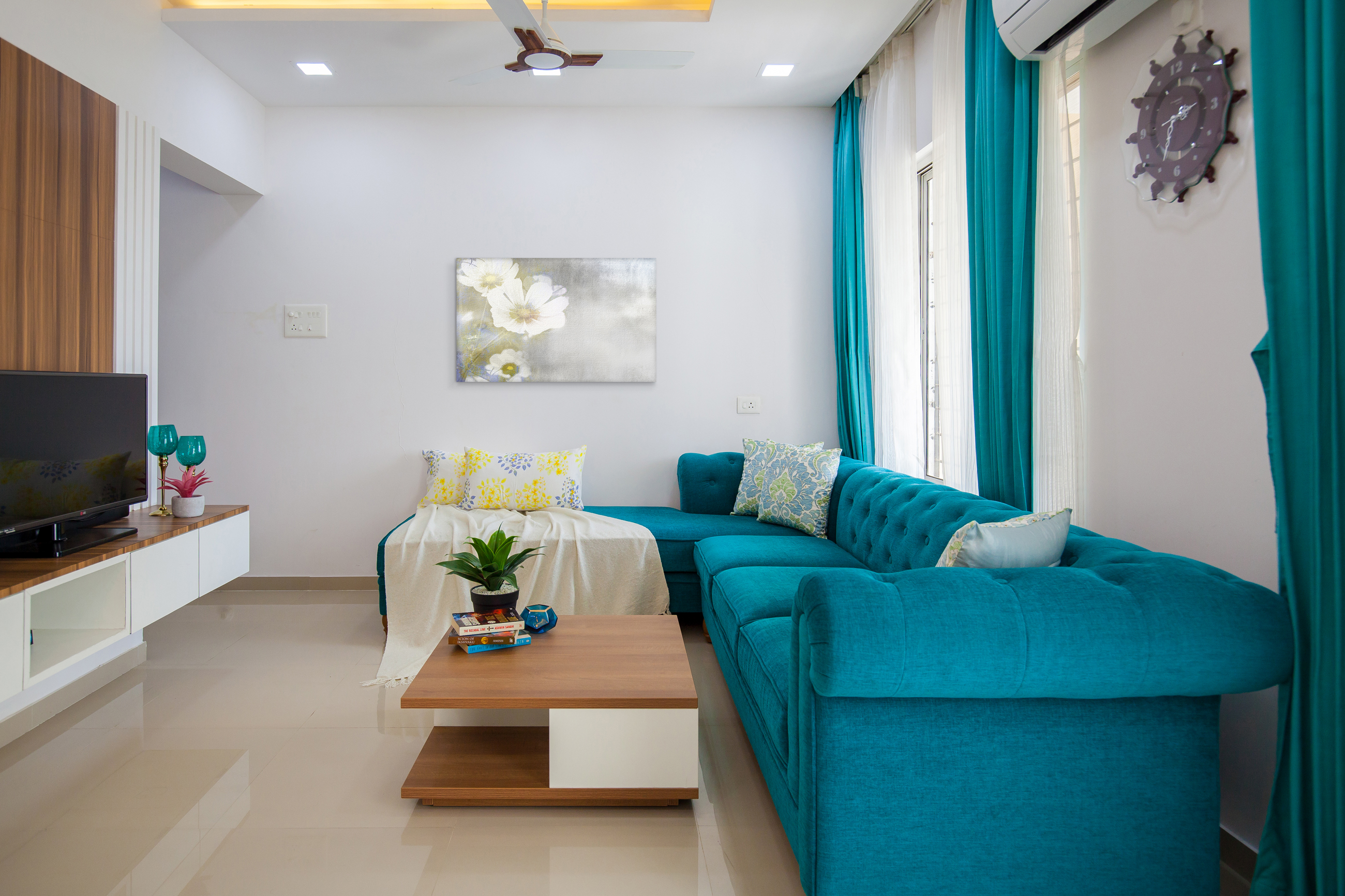 Bright Blue Toned Modern Style Spacious Living Room Design | Livspace