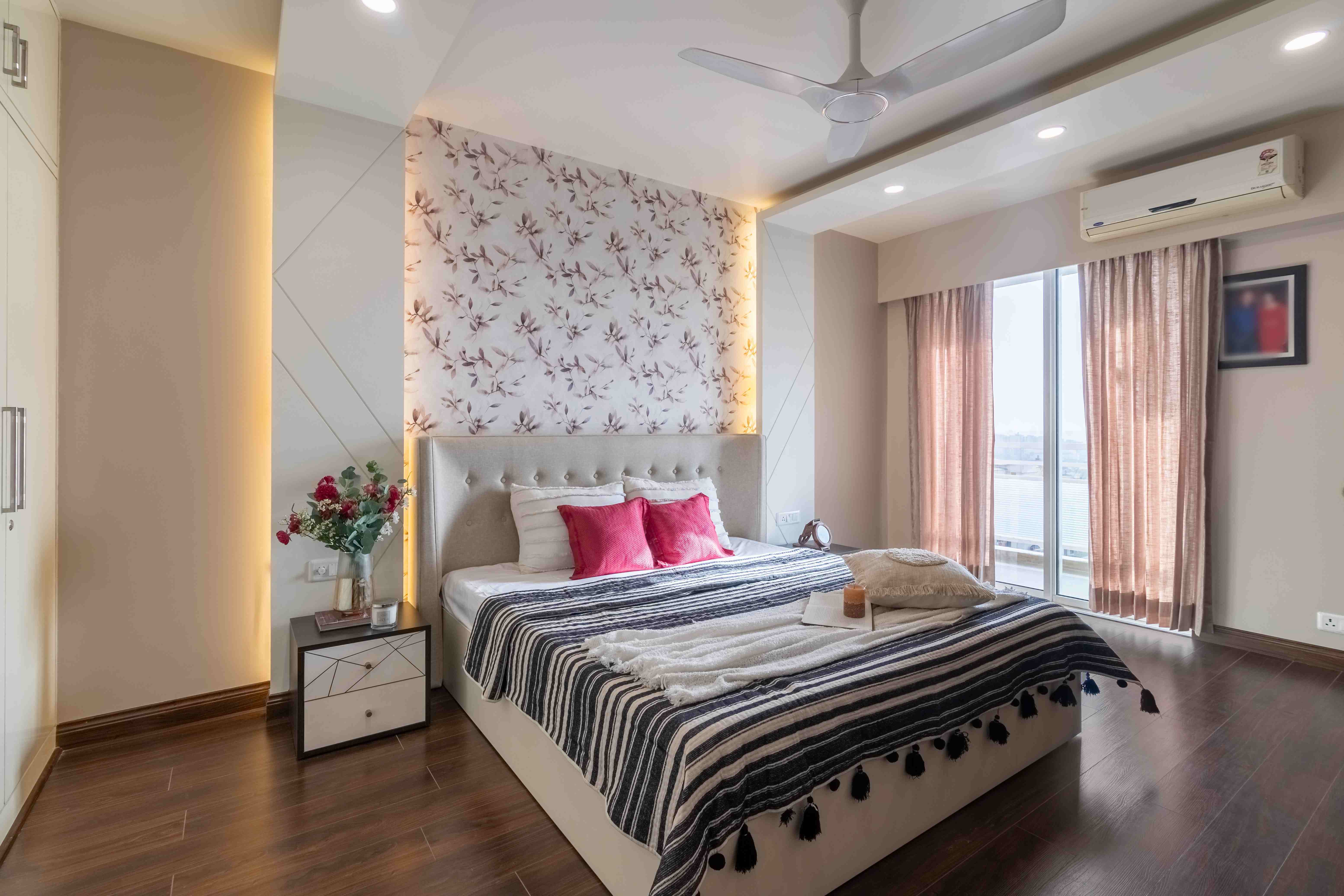 Spacious Bedroom Design With LED Strips And Spotlights | Livspace
